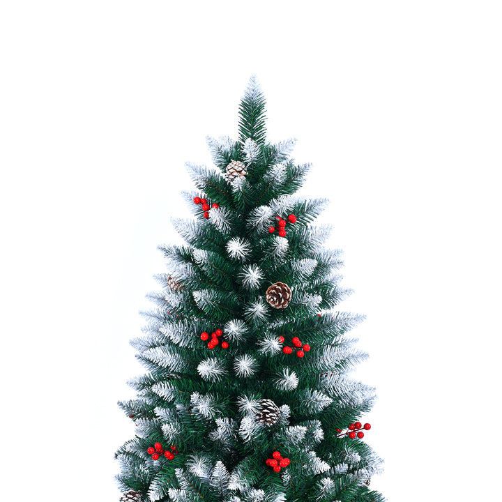 Decorated Christmas tree with red berries and pinecones