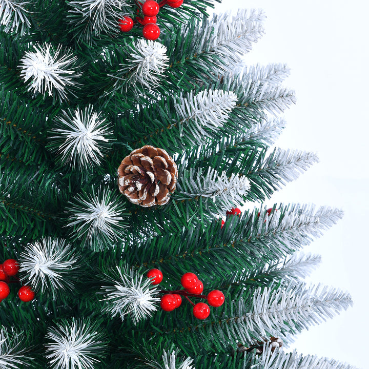 Close Up Decorated Christmas tree with red berries and pinecones