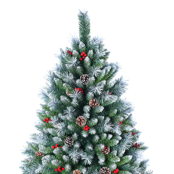 Decorated Christmas tree with green needles, red berries, and pinecones