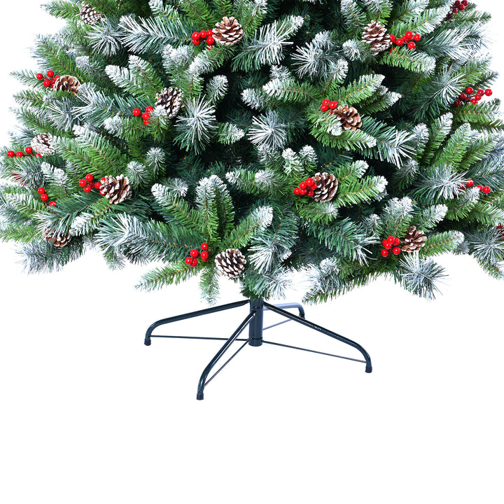 Decorated Christmas tree with green needles, red berries, and pinecones