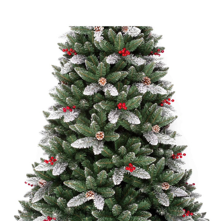 Decorated Christmas tree with red berries and pinecones