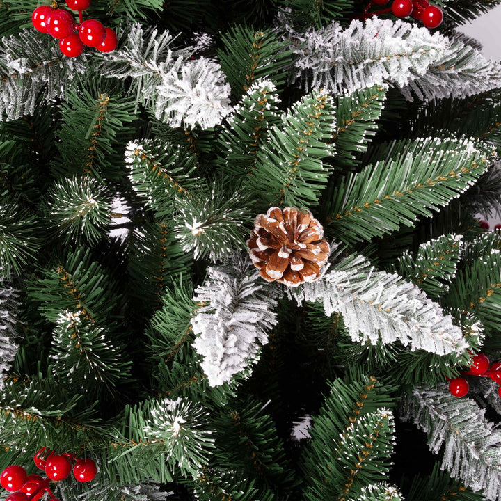Close Up of Decorated Christmas tree with red berries