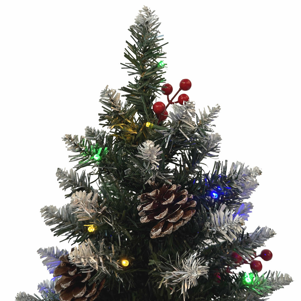 Decorated Christmas tree with lights and pinecones 