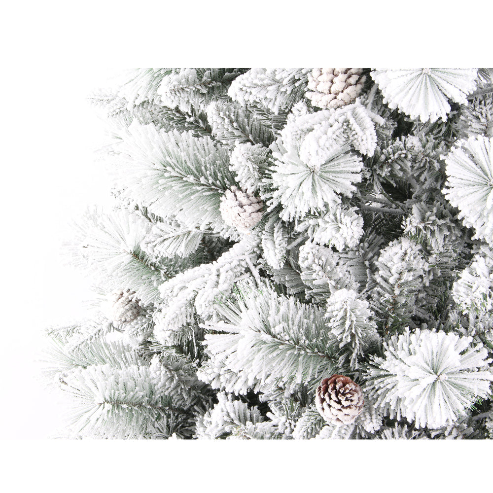 Frosted artificial Christmas tree with pine cones 