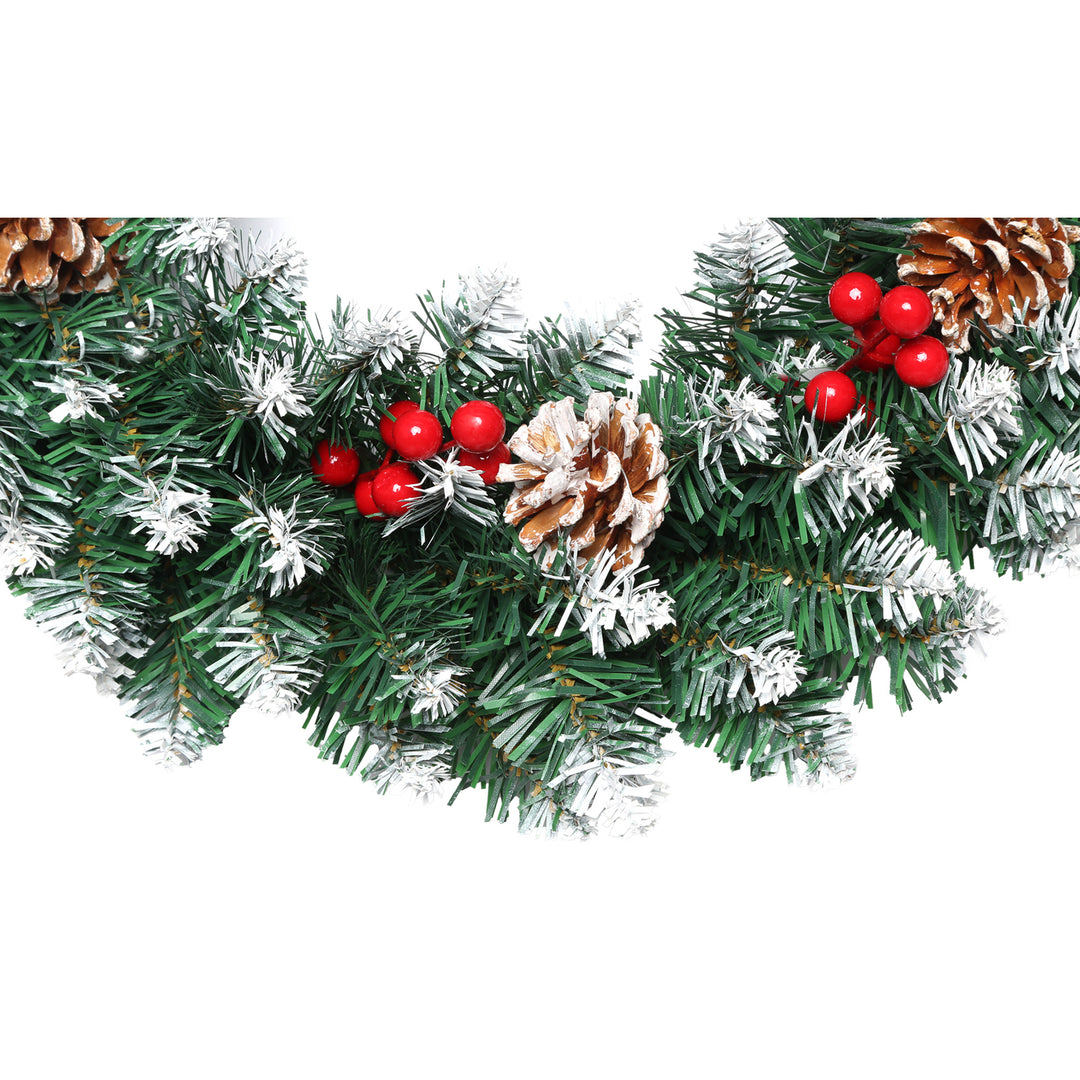 Decorative Christmas garland with pine cones and red berries