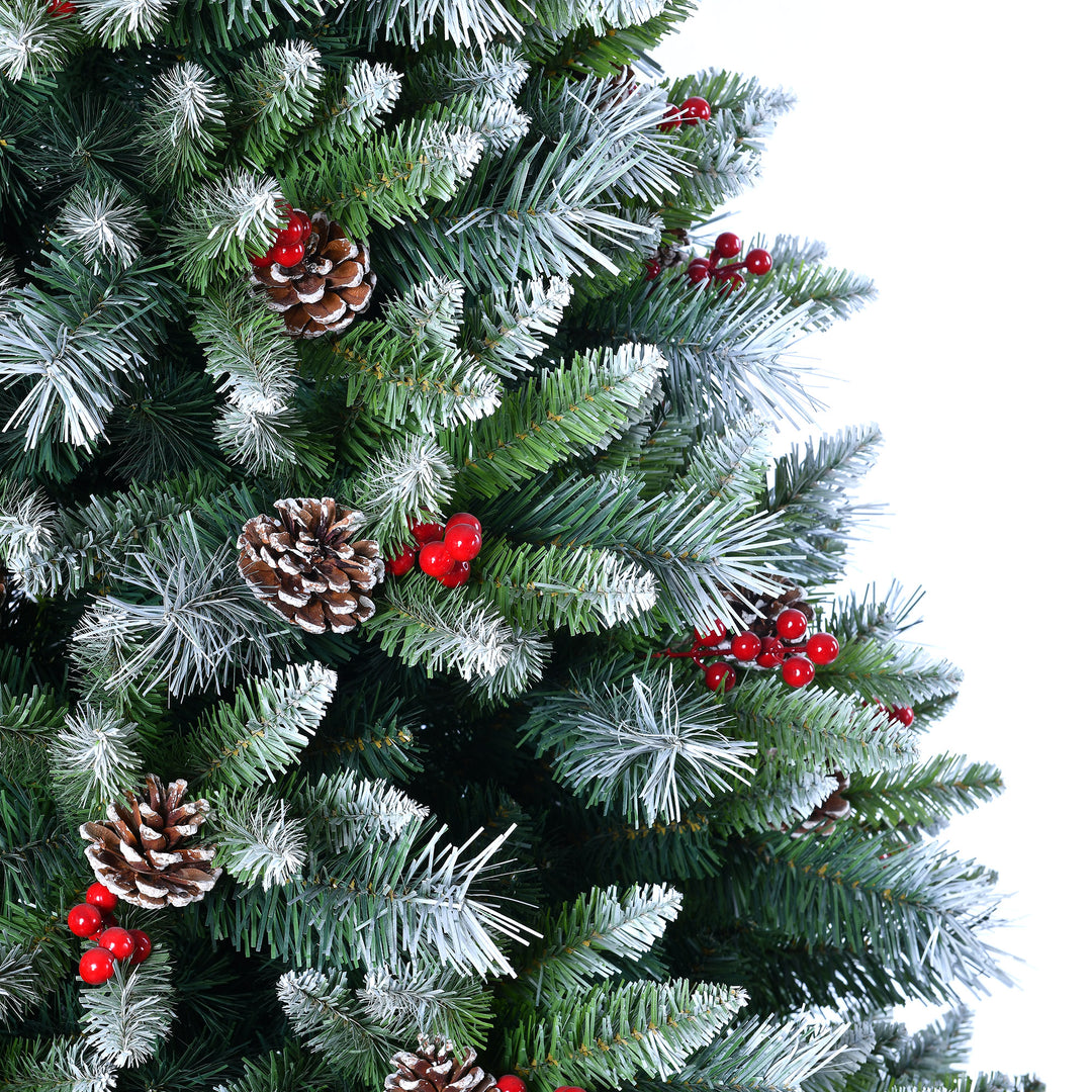 Artificial Christmas tree with green needles, pinecones, and red berries