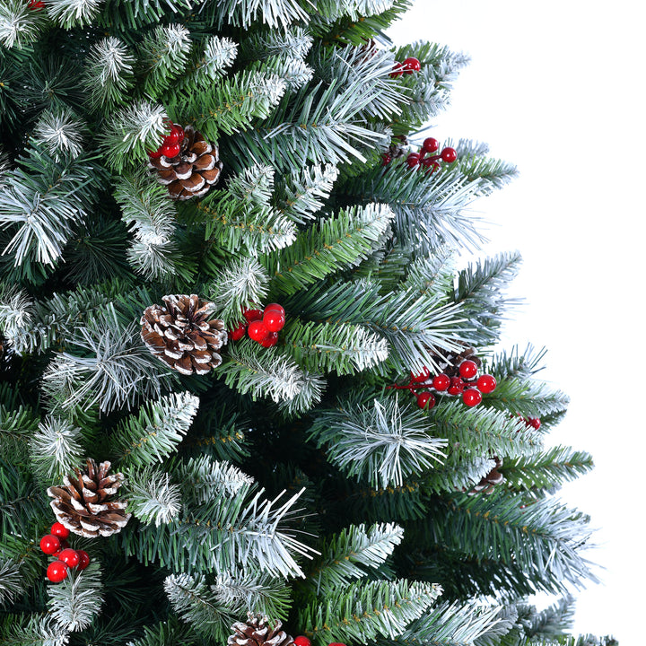 Artificial Christmas tree with green needles, pinecones, and red berries