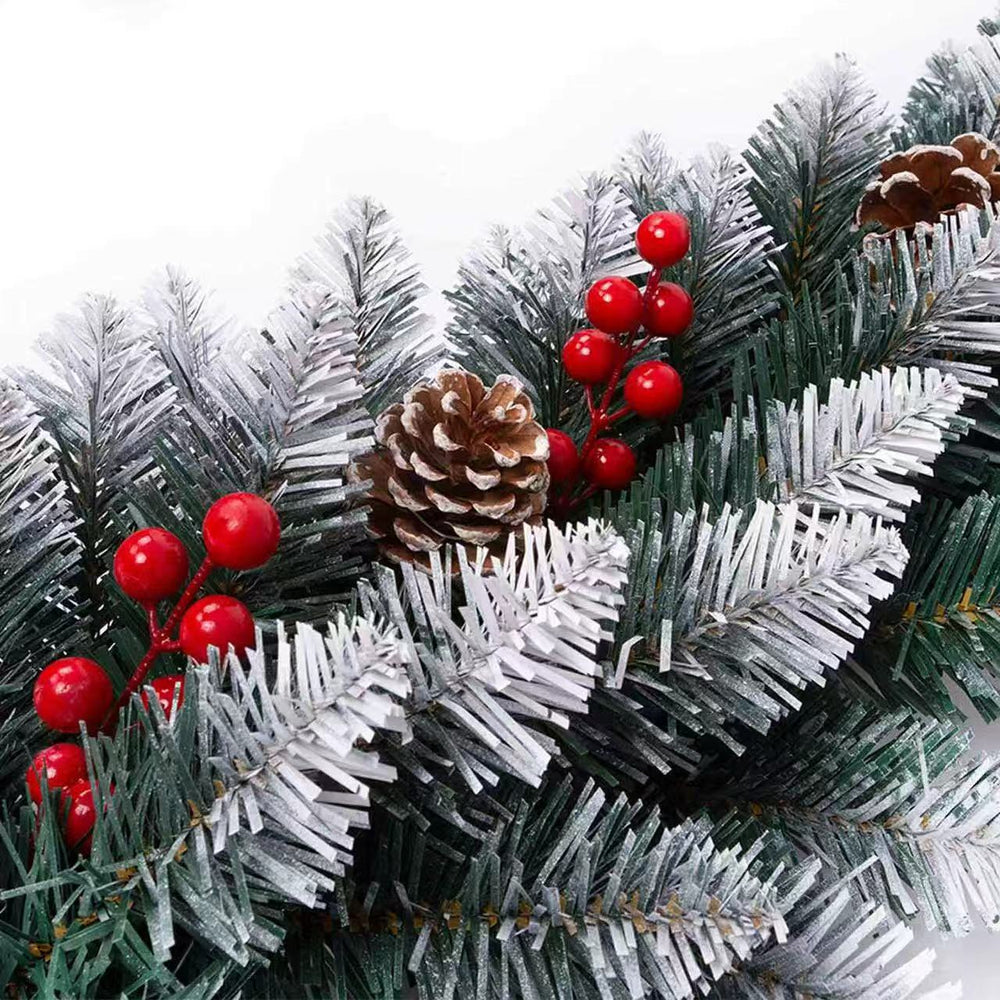 Decorative Christmas garland with pine cones and berries