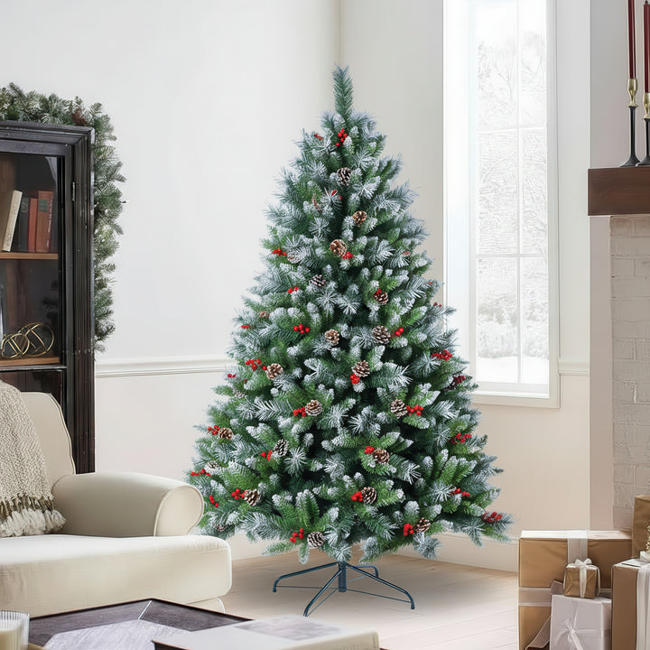 Decorated Christmas tree with green needles, red berries, and pinecones 