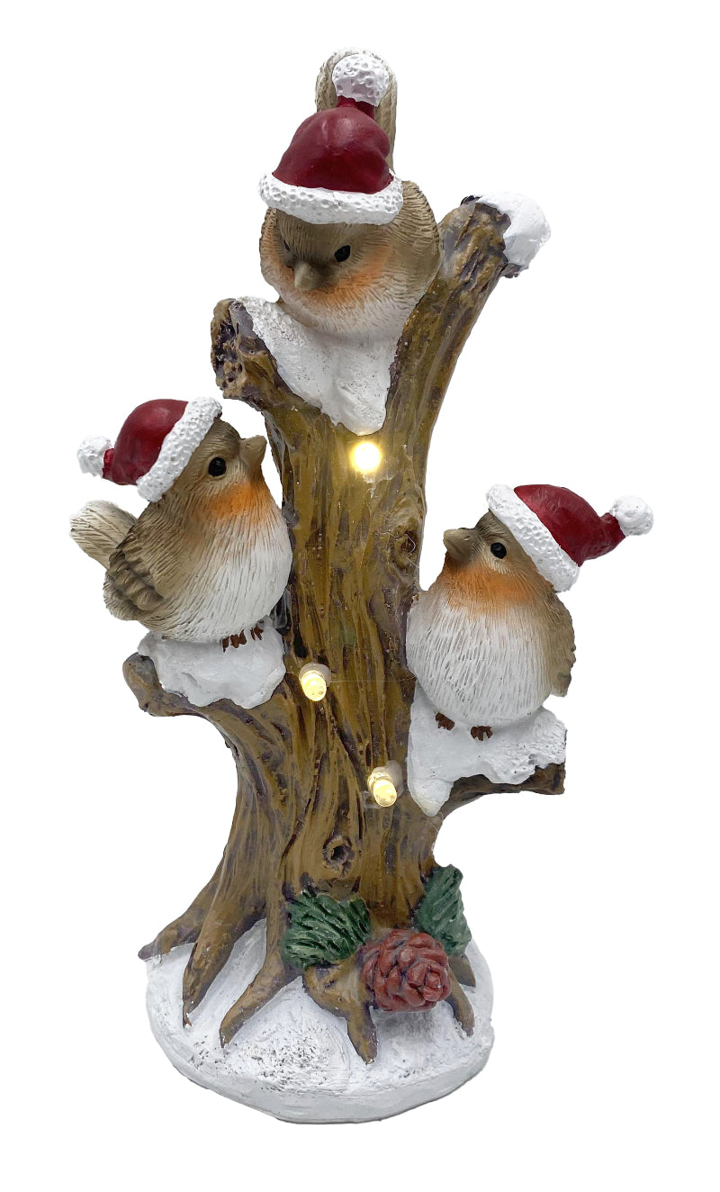 Robins with Santa Hats On Tree Trunk